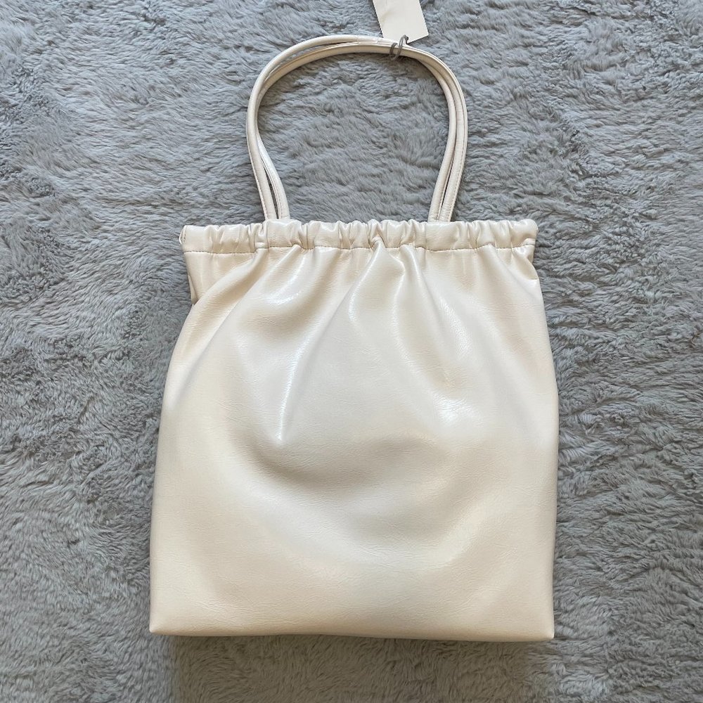A New Day Tote Bags